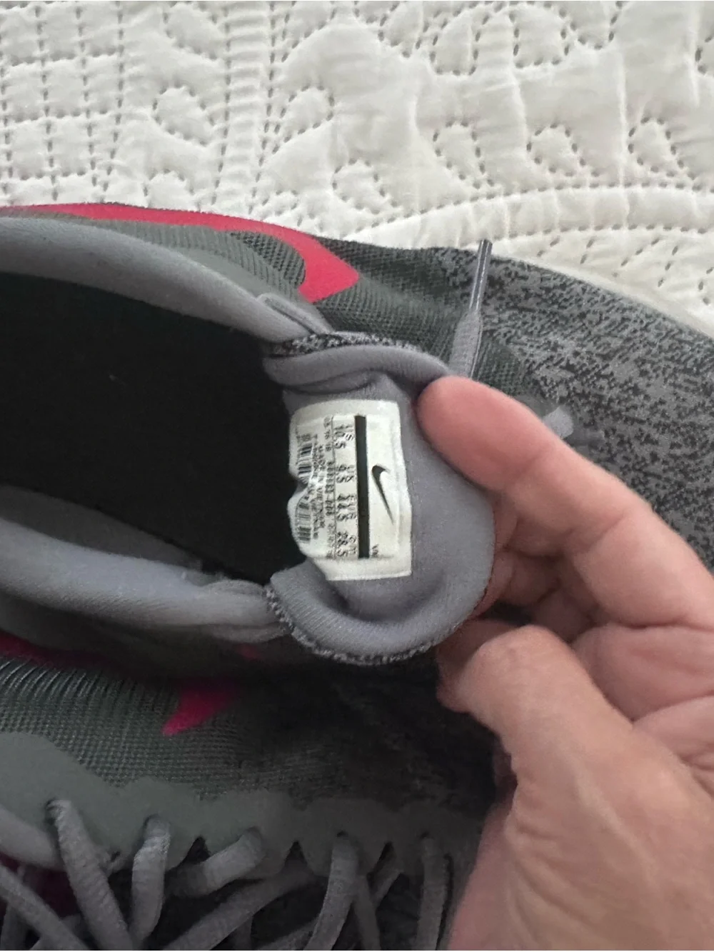 Nike men’s Gray and Pink Training Sneakers